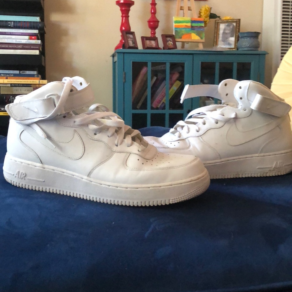 All white Nike high top Air Force ones Size: 12